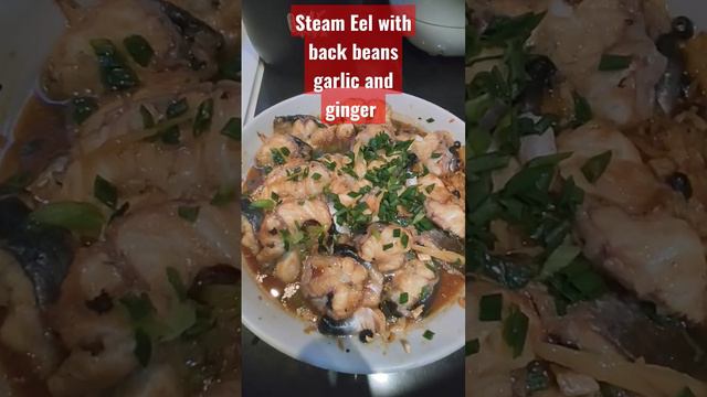 STEAM EeL WITH BLACK BEANS GARLIC AND GINGER.