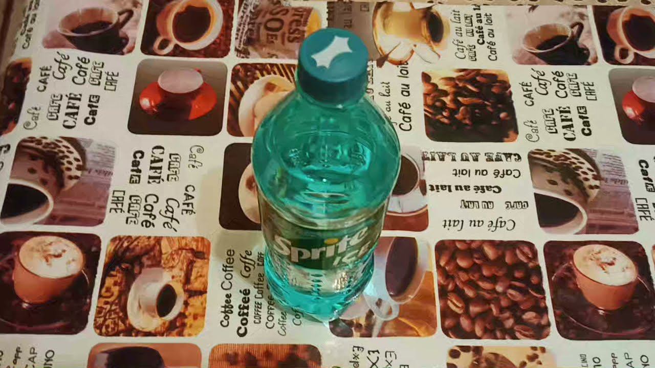 Газированная вода Sprite Ice со вкусом лимона ,лайма и мяты 900мл