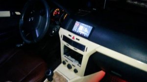 Astra H с установленной магнитолой A1V1 (вверху, вместо БК).