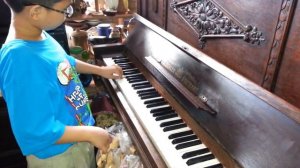 Adam testing a piano C.Oehler Stuttgart