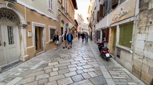 Poreč (Istria-??Croatia): a relaxing walk through the historic centre at the end of the day