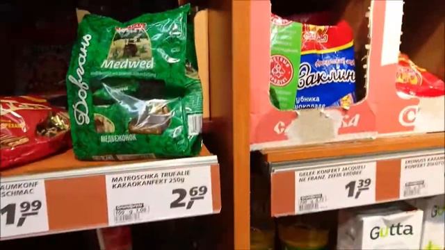 Контейнеры для пожертвования, шпермюль, полки русских продуктов в магазинах