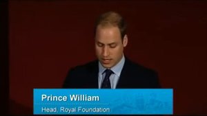 Prince Charles looks on in admiration as William speaks against illegal poaching