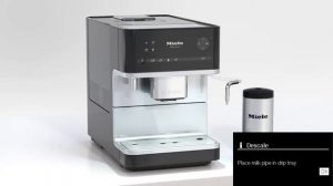 Выполнение программы декальцинации в кофемашине Miele