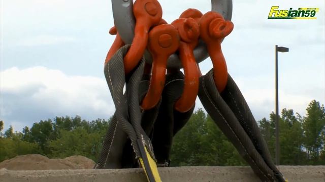 Crane Grove RT650E Moving Concrete Road Barriers In Crane Operator Training