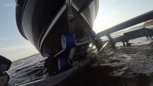 Подъем лодки на прицеп.