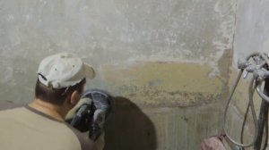 Снятие краски со стены