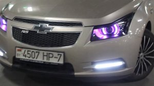 Chevrolet Cruze линзы в фарах и ДХО Camaro Style