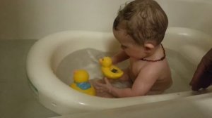 Rubber ducky bath fun (8 mo)