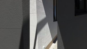 Жидкий травертин на фасаде