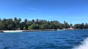 Boat leaving Kendhoo Island, Baa Atoll Maldives