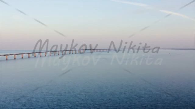Oresund bridge. A long tunnel bridge with an artificial island between Sweden and Denmark., Aerial смотреть онлайн