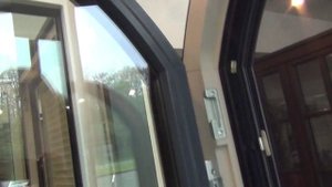 Unilux. Арочное окно из дерева-алюминия