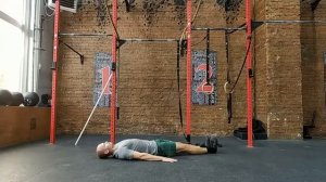 Подъем прямой ноги лежа на спине с предактивацией