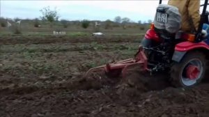 МТЗ 152 (16" колеса) с двухкорпусным плугом