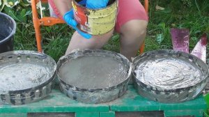 Креативные кочки для цветочной грядки из цемента.