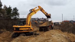 Колесный экскаватор JCB JS 160W
