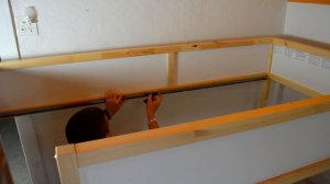 Putting Together the Kura IKEA Reversible Bed Assembly Upside Down 1 Man
