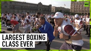 Thousands join boxing legend in Mexico City in bid to break record for largest boxing class
