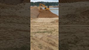 Работа экскаватора на откосы