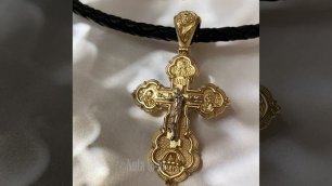 Нательный крест из желтого золота на кожаном шнурке гайтане.mp4