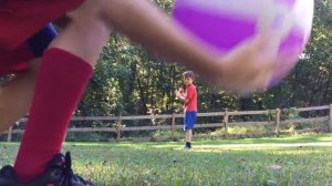 Half whiffle ball game half beach ball
