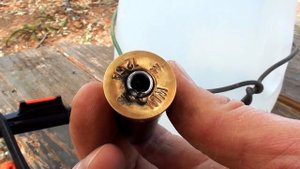 Из воздушки по патрону дробовика.