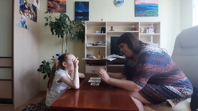 Занятие с неслышащим ребенком по обучению произношению.