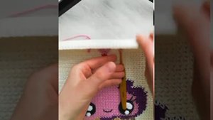 Вышивка по вязаному полотну.