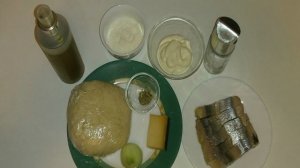 Пицца с селедкой