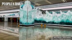 Waves roaming on the glasses-free 3D screens of Shanghai Hongqiao Railway Station