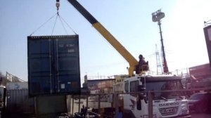 Погрузка морского контейнера на авто-манипулятор Daewoo Novus