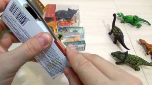 Игрушки ДИНОЗАВРЫ в КОРОБОЧКАХ 7 штук и котик распаковка Toy DINOSAURS in a box 7 pieces