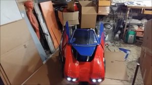 Костюм Oптимус Прайм трансформирующийся в машину.