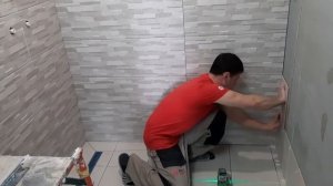 Приспособление для нанесения плиточного клея на плитку.