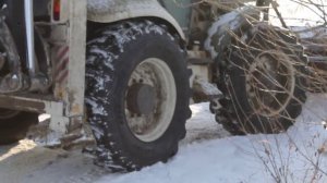 поворотный отвал на экскаватор погрузчик.