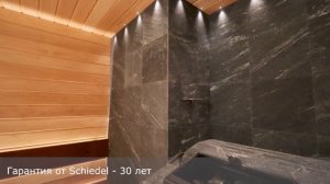 Внутренняя отделка парной. Печь в камне с закрытой каменкой.