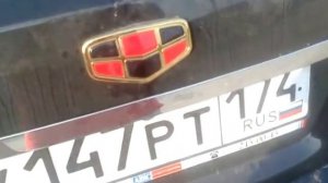 Emgrand EC-7 Кнопка открытия багажника в логотипе