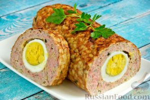 Украсит пасхальный стол.
МЯСНОЙ РУЛЕТ С РИСОМ И ЯЙЦАМИ