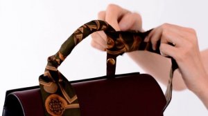 Как правильно привязать ленточку на сумку.