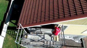 Puujulkisivun maalaus