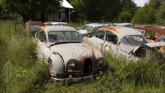 Saab cars at car graveyard Båstnäs смотреть онлайн