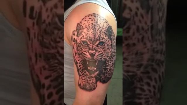 Realistic Leopard Tattoo by Eugene Pirie