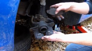 How to change brake rotors and pads on a Peugeot 206