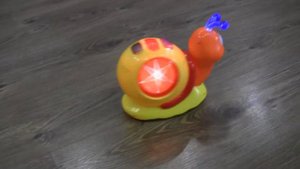 ИГРУШКА: МУЗЫКАЛЬНАЯ УЛИТКА -  TOY MUSICAL SNAIL, УЛИТКА