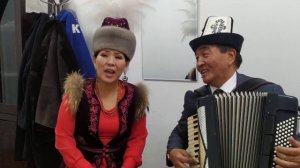 КЫЙЫЛЫП ТУРАМ (К.Досмамбетова)– ГҮЛЗАТ Байзакова, кошт: Кубанычбек Р. Э.