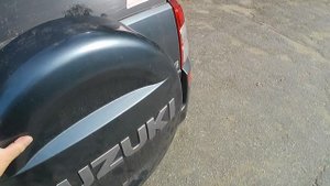 SuzukiGrandVitara.Колпак на запаске теперь не стучит. Ремонт чехла жидкой кожей