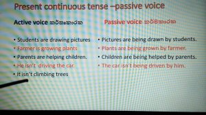 present continuous tense active voice and passive voice