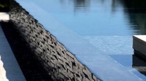 Cox Pools  - Rim Overflow with Black Pearl and Ivory Travertine