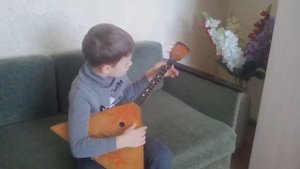 Игра на балалайке